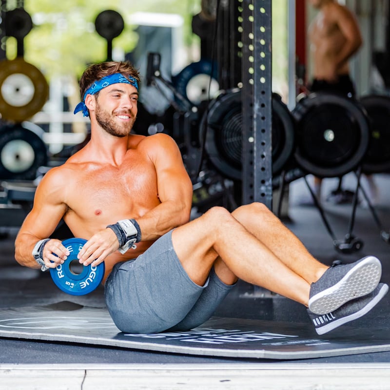 Coach is working out in the gym.